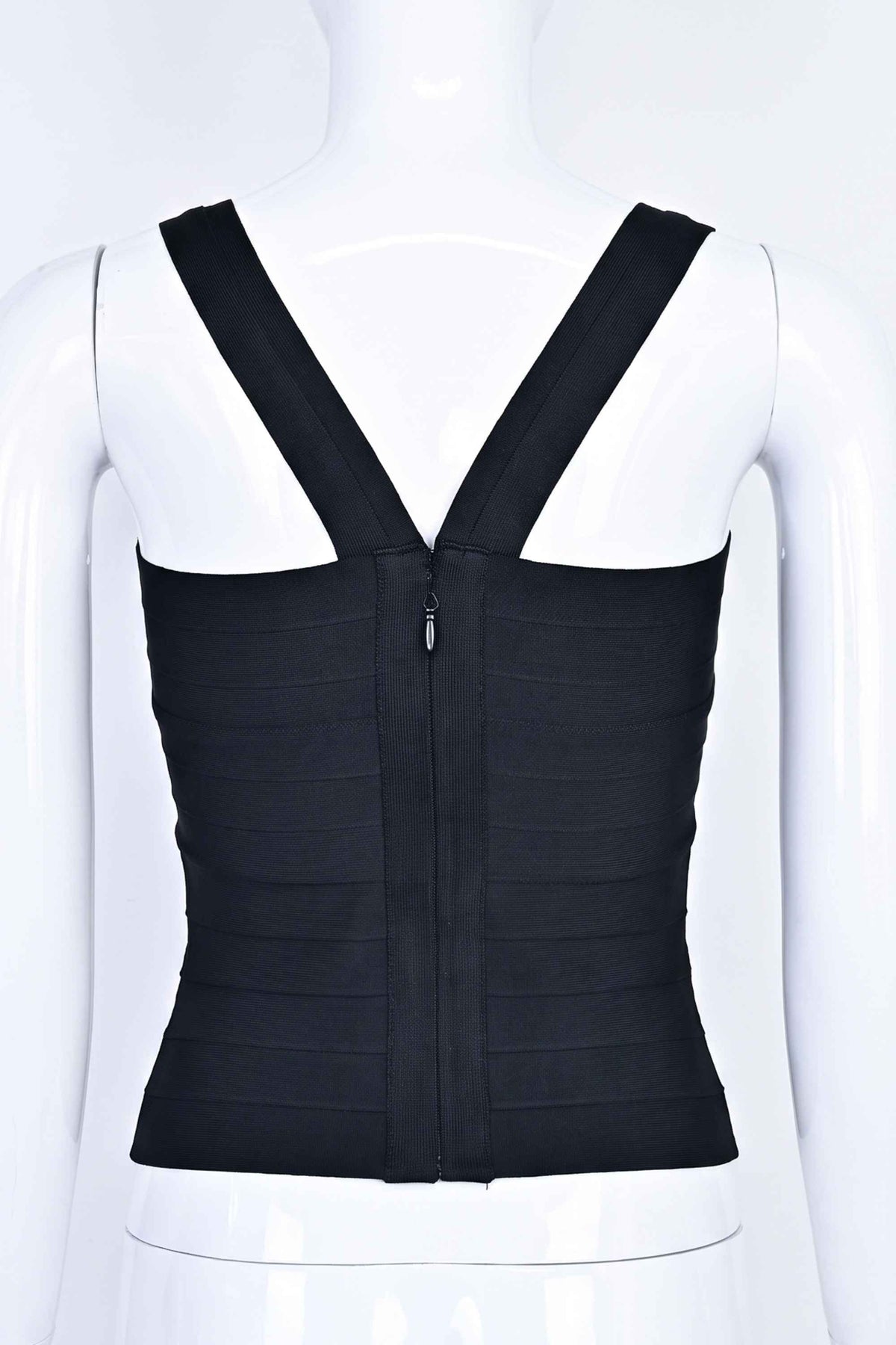 Woman wearing a figure flattering Jay Bandage Top - Classic Black BODYCON COLLECTION
