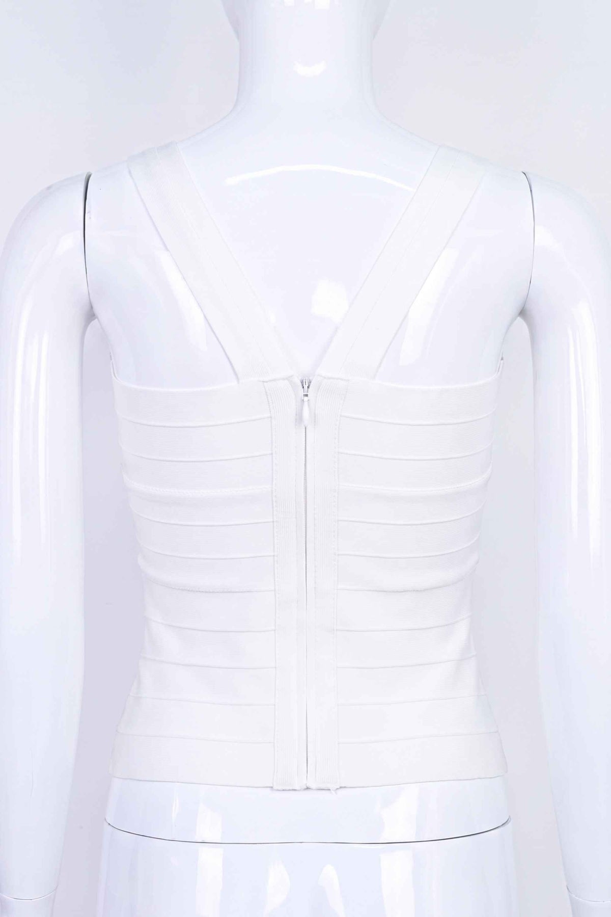 Woman wearing a figure flattering Jay Bandage Top - White Pearl BODYCON COLLECTION