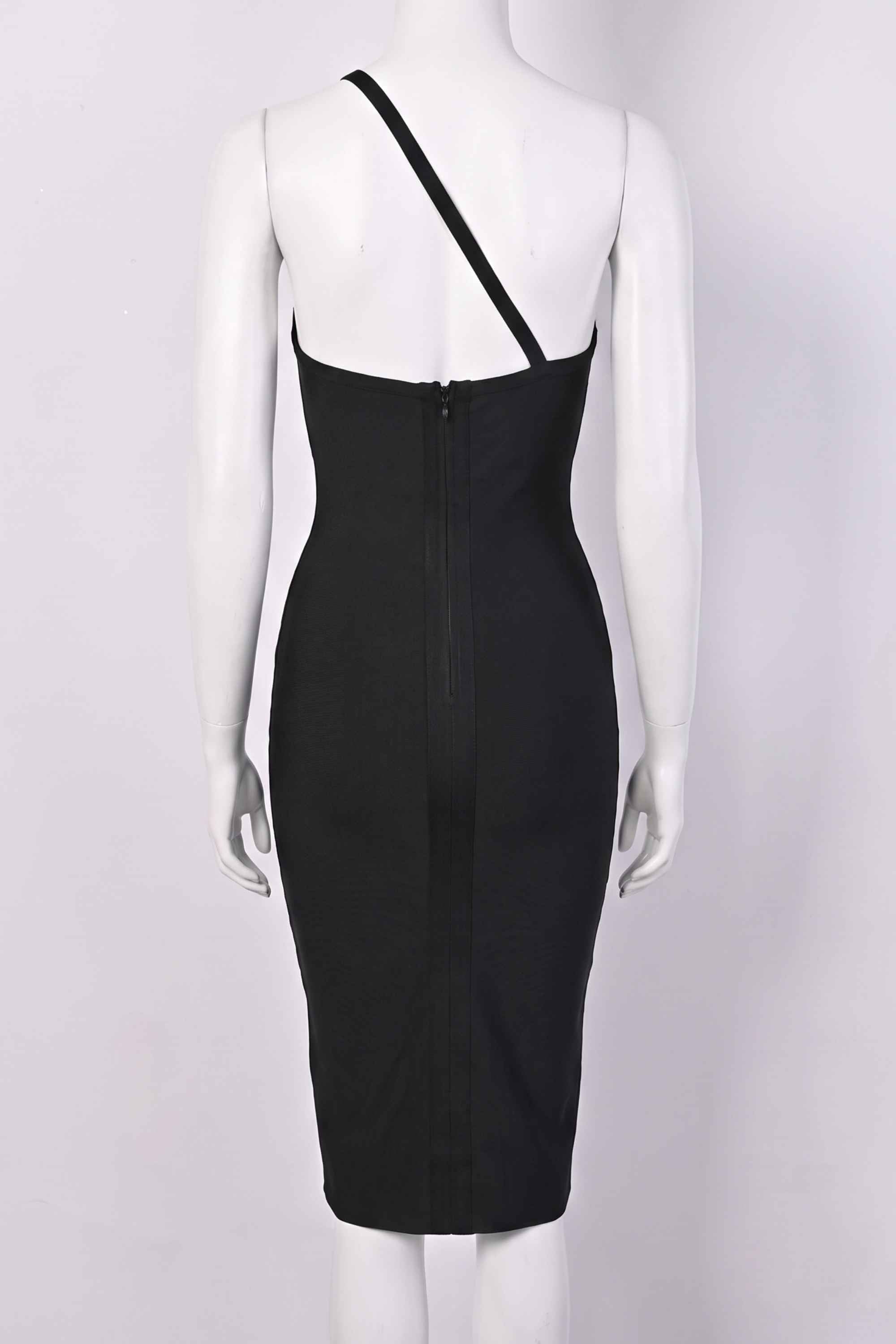 Woman wearing a figure flattering Joi Bodycon Midi Dress - Classic Black Bodycon Collection
