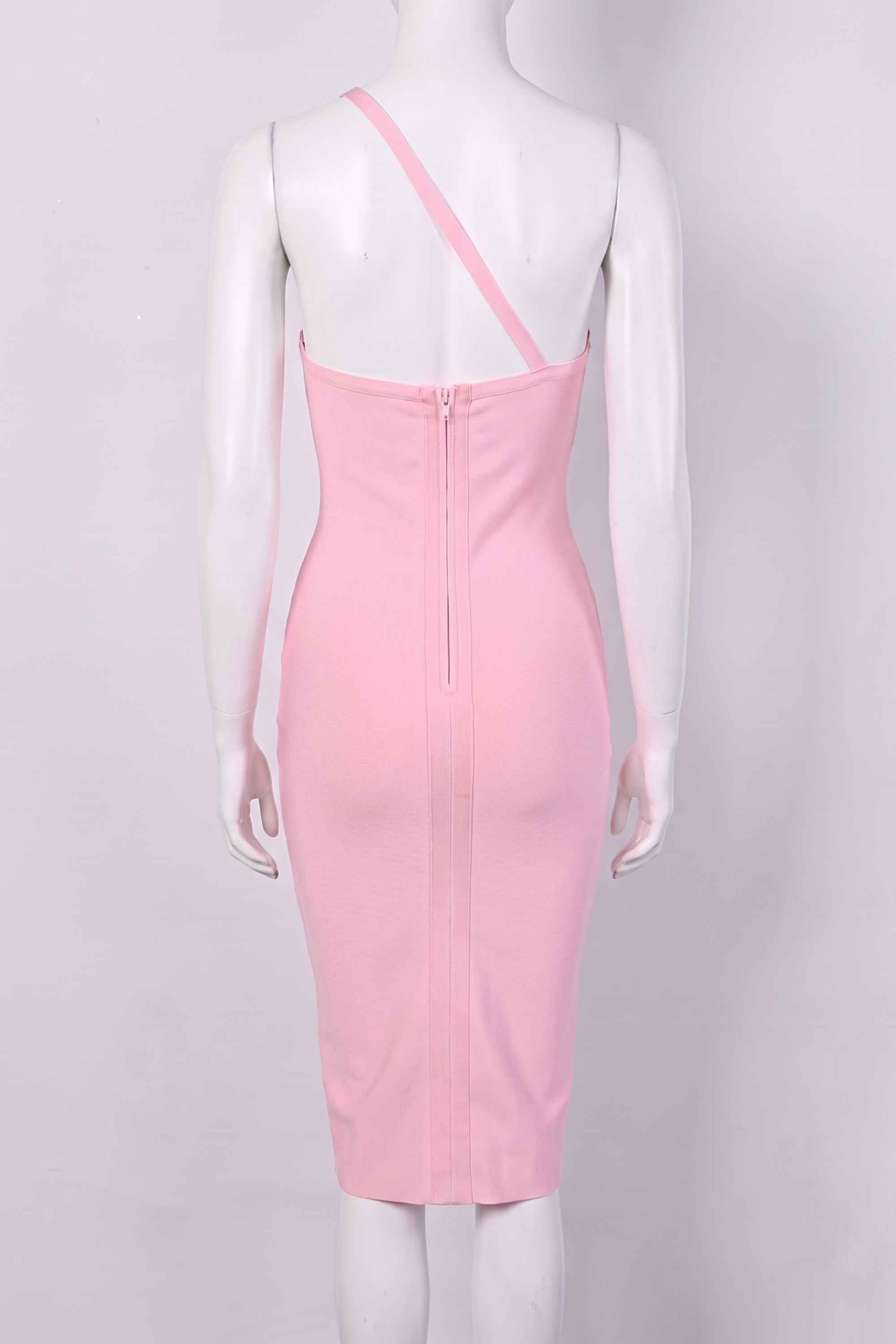 Woman wearing a figure flattering Joi Bodycon Midi Dress - Dusty Pink Bodycon Collection
