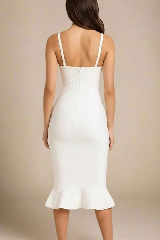 Woman wearing a figure flattering Joy Bandage Midi Dress - Pearl White Bodycon Collection