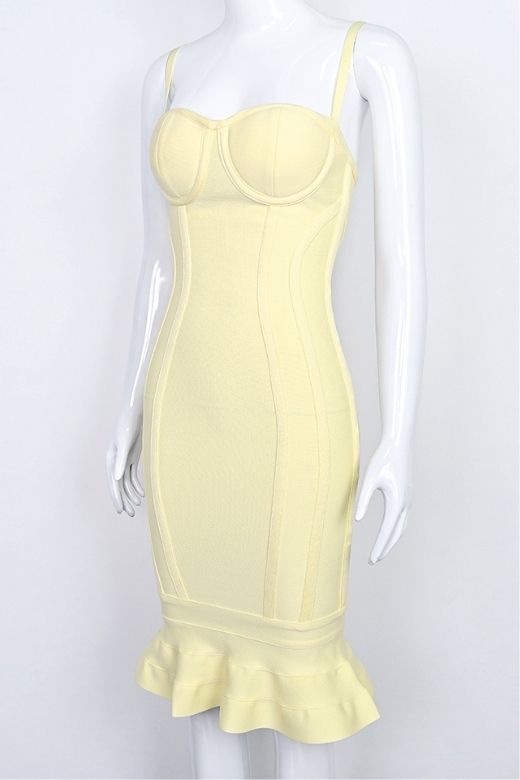Woman wearing a figure flattering Joy Bandage Midi Dress - Sun Yellow Bodycon Collection