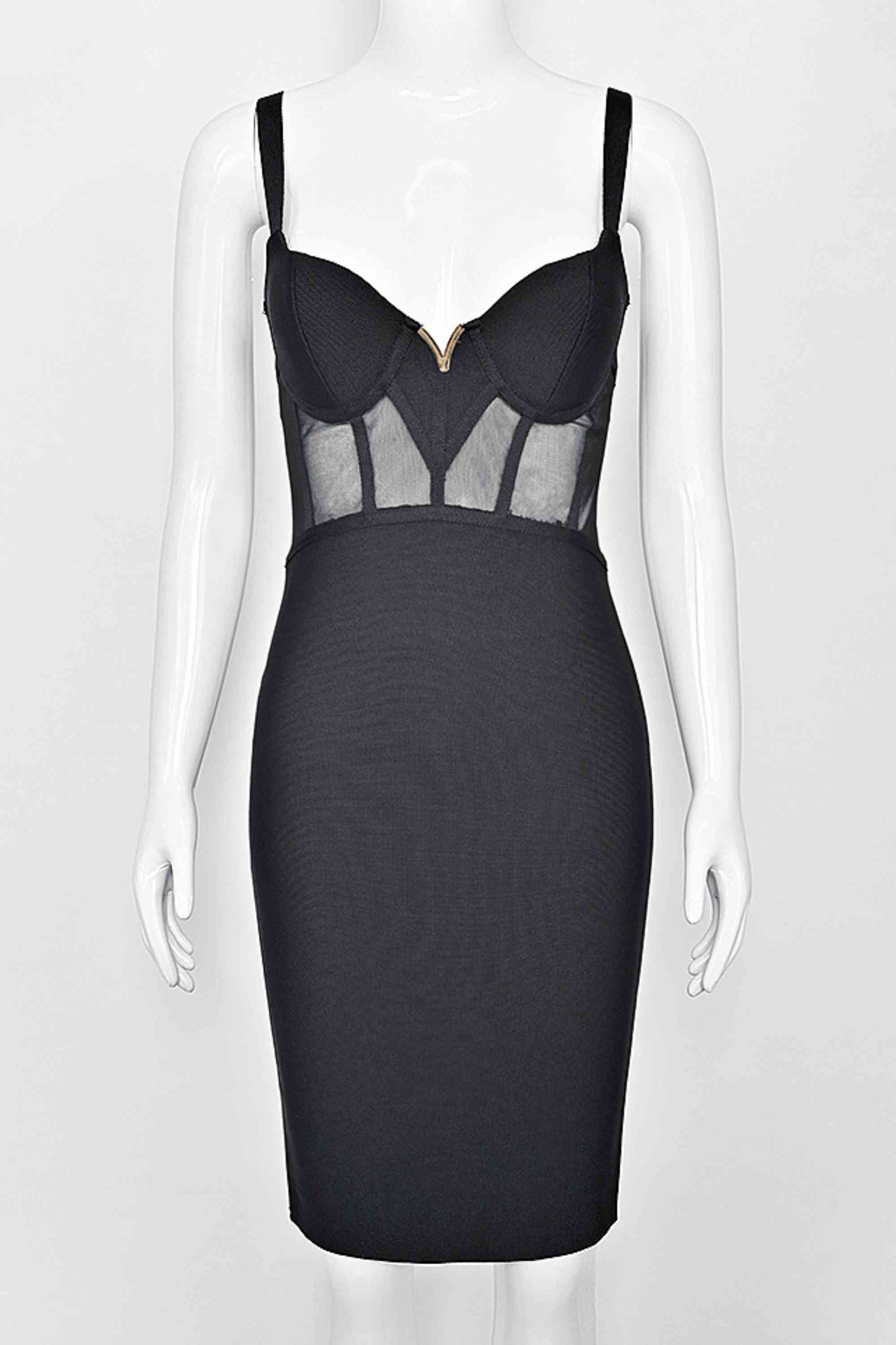Woman wearing a figure flattering Juliette Bodycon Dress - Classic Black Bodycon Collection