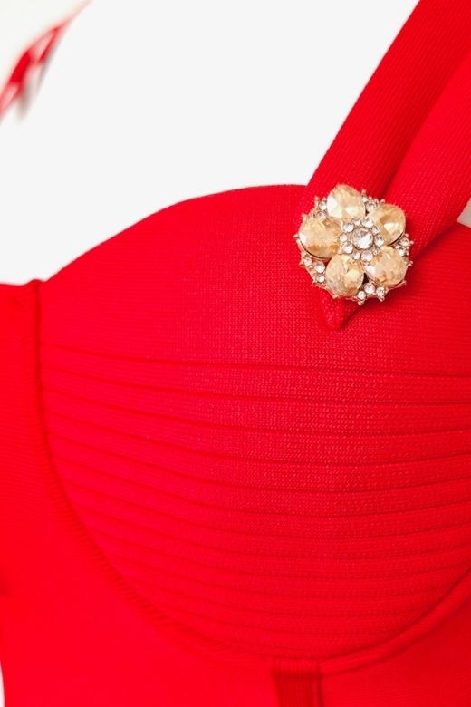 Woman wearing a figure flattering Kate Bandage Dress - Lipstick Red Bodycon Collection