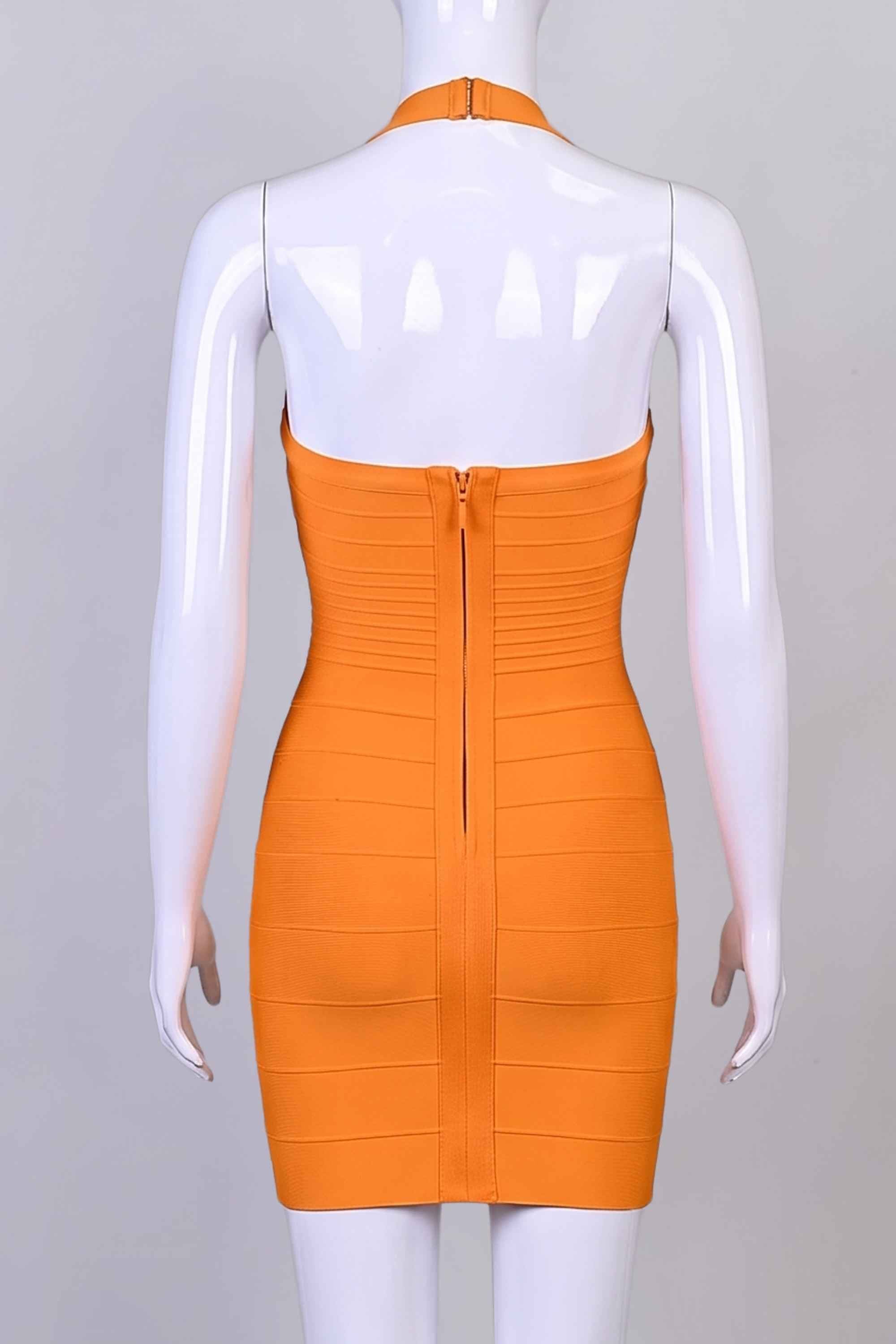 Woman wearing a figure flattering Kia Bandage Mini Dress - Apricot Orange BODYCON COLLECTION Pty Ltd