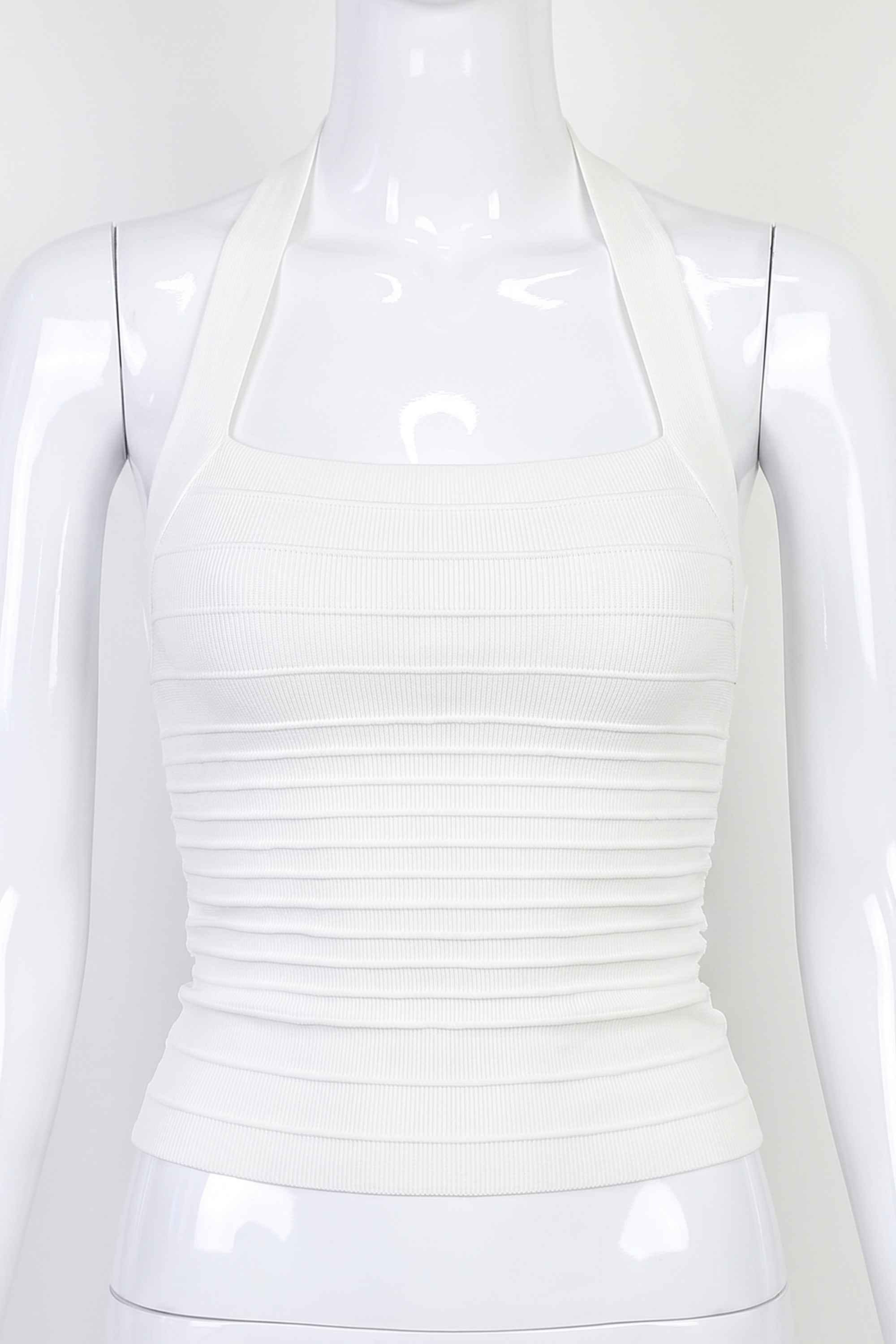 Woman wearing a figure flattering Kia Bandage Top - Pearl White BODYCON COLLECTION Pty Ltd