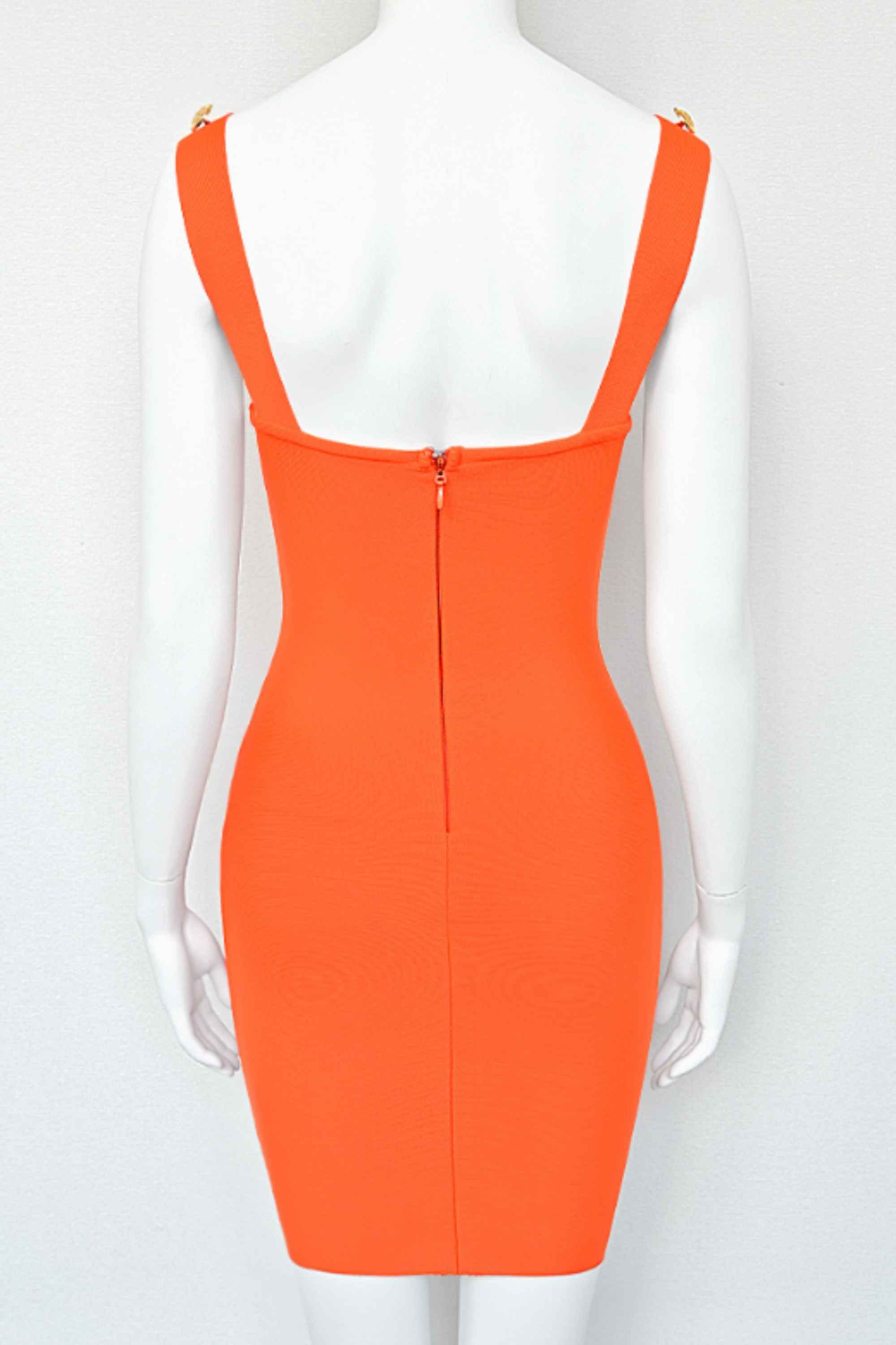 Woman wearing a figure flattering Kiki Bandage Mini Dress - Apricot Orange BODYCON COLLECTION