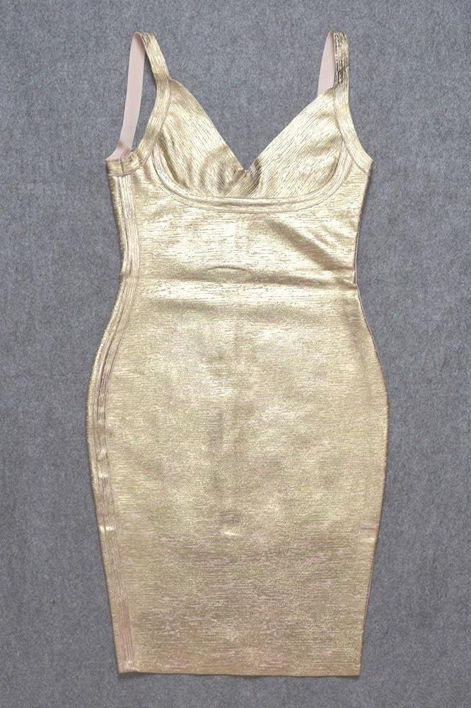 Woman wearing a figure flattering  Kit Bandage Dress - Gold Bodycon Collection
