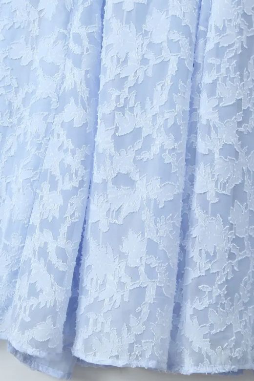 Woman wearing a figure flattering  Kora Bodycon Maxi Dress - Baby Blue BODYCON COLLECTION