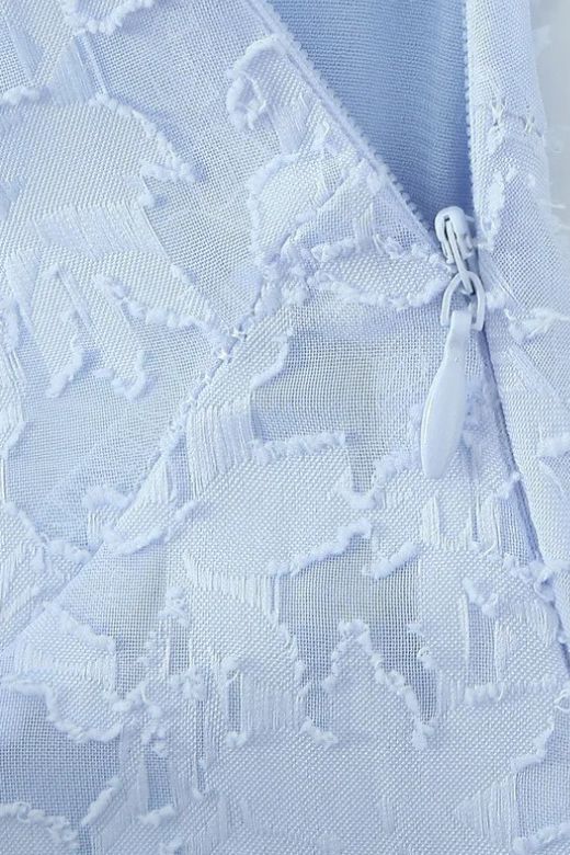 Woman wearing a figure flattering  Kora Bodycon Maxi Dress - Baby Blue BODYCON COLLECTION