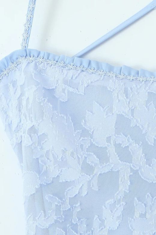 Woman wearing a figure flattering  Kora Bodycon Maxi Dress - Baby Blue BODYCON COLLECTION