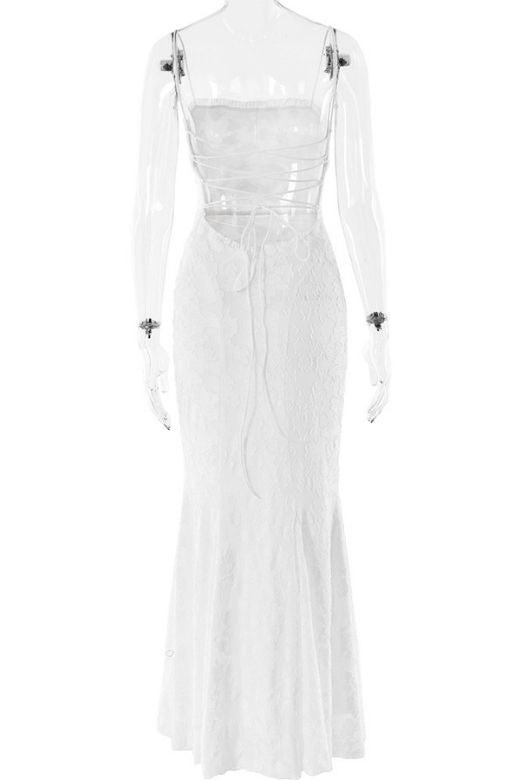 Woman wearing a figure flattering Kora Bodycon Maxi Dress - White Pearl BODYCON COLLECTION