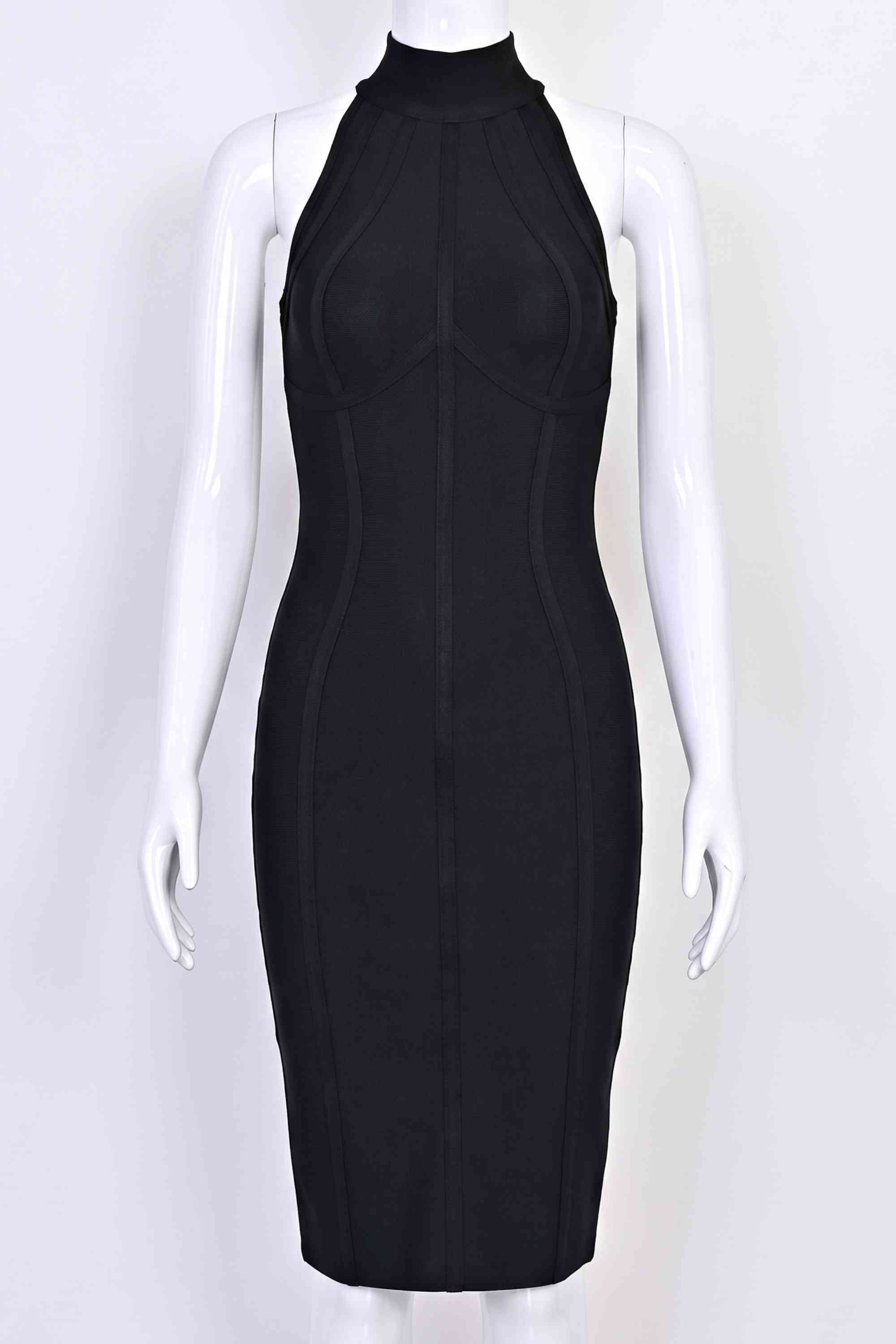 Woman wearing a figure flattering Lea Bandage Midi Dress - Classic Black Bodycon Collection
