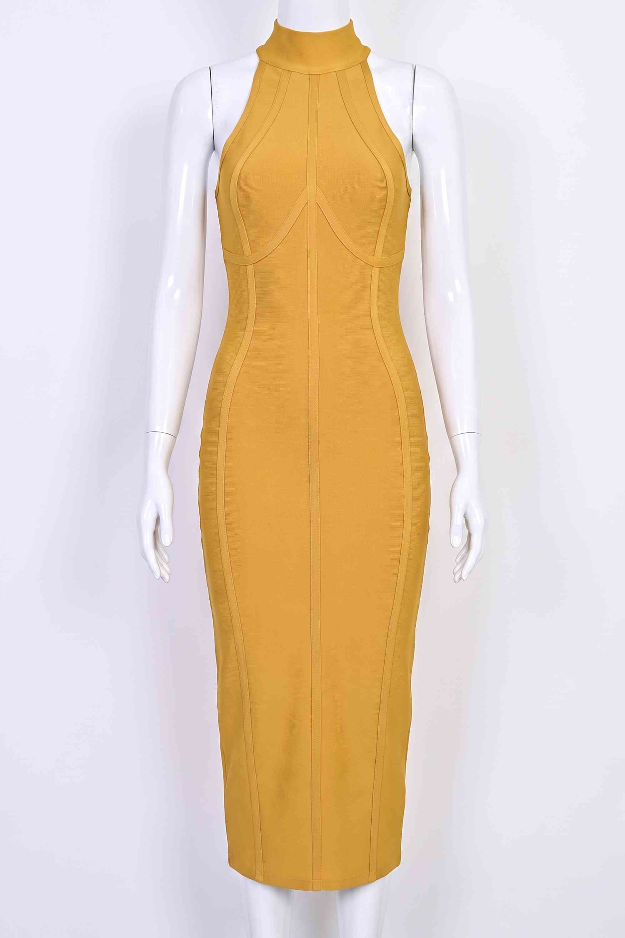 Woman wearing a figure flattering Lea Bandage Midi Dress - Mustard Yellow Bodycon Collection