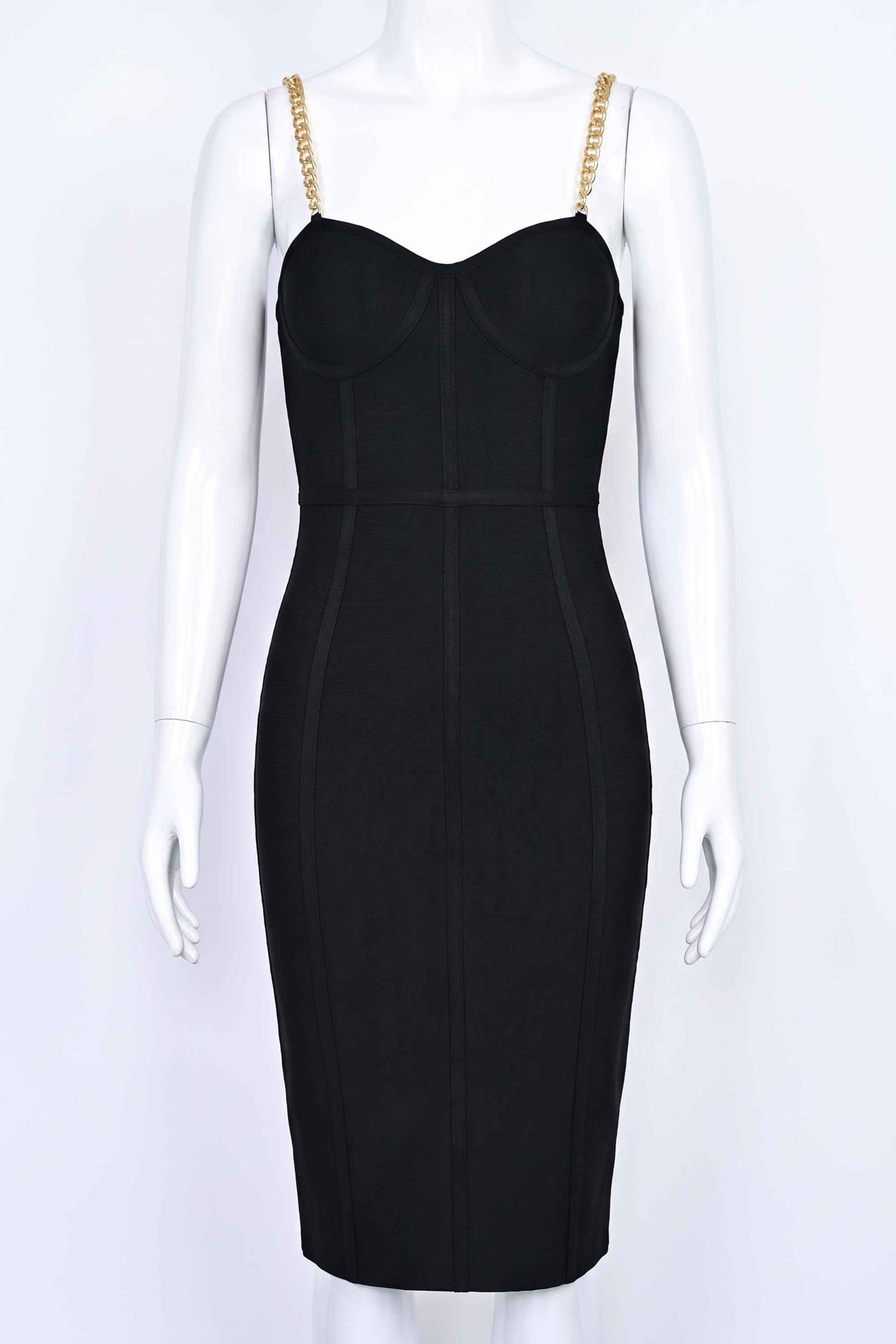 Woman wearing a figure flattering Leah Bodycon Dress - Classic Black Bodycon Collection