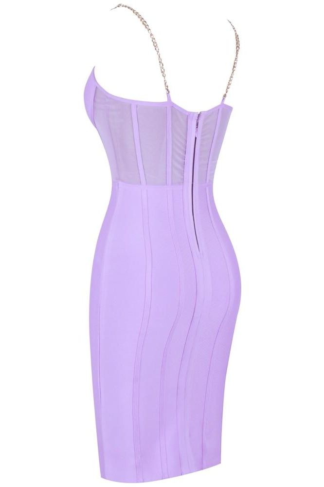 Woman wearing a figure flattering Leah Bodycon Dress - Violet Bodycon Collection