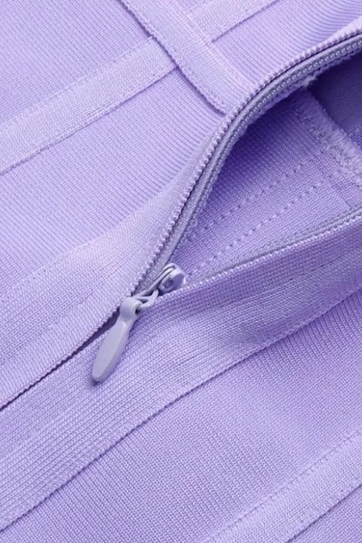 Woman wearing a figure flattering Leah Bodycon Dress - Violet Purple Bodycon Collection