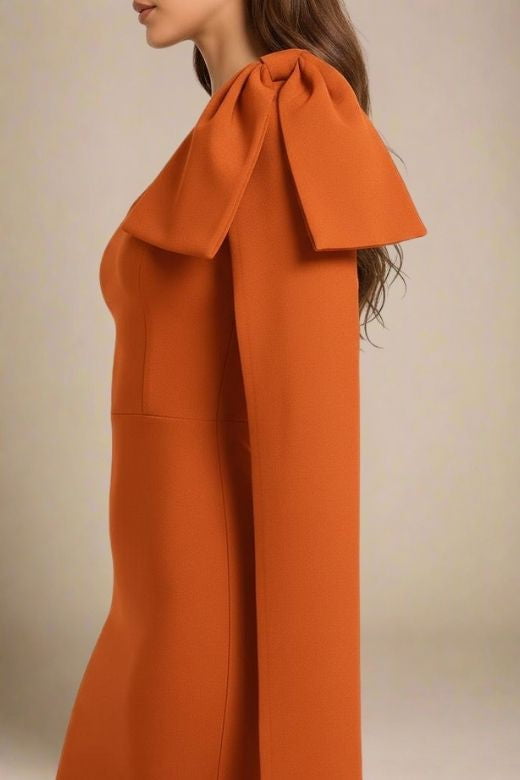 Woman wearing a figure flattering Lela Long Sleeve Bandage Midi Dress - Apricot Orange BODYCON COLLECTION