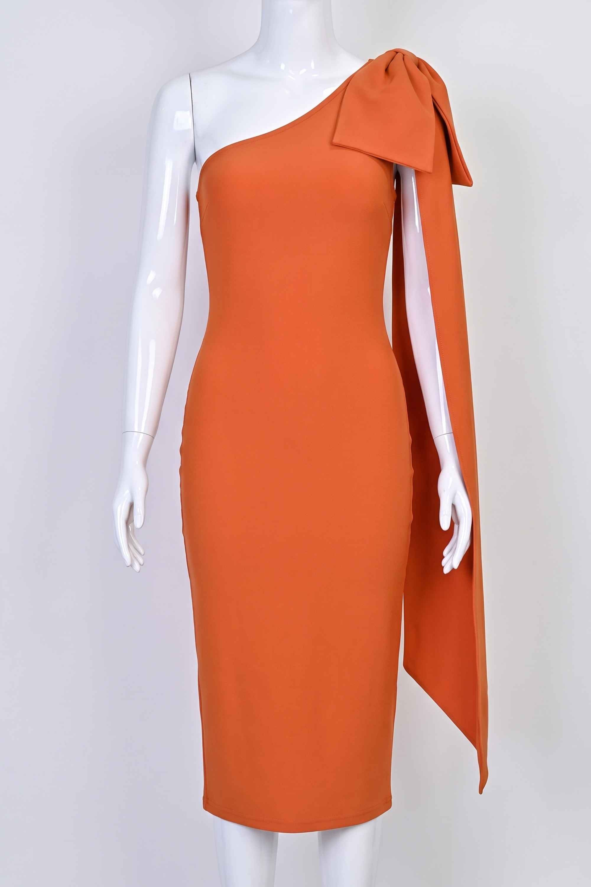 Woman wearing a figure flattering Lela Long Sleeve Bandage Midi Dress - Apricot Orange BODYCON COLLECTION