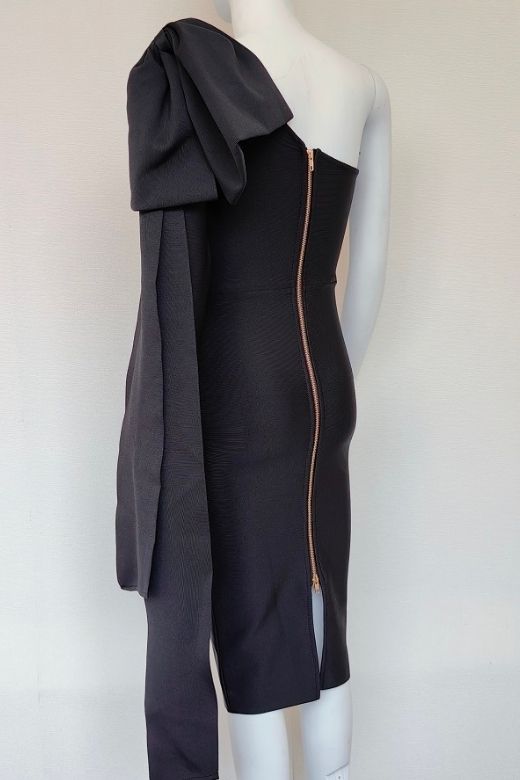 Woman wearing a figure flattering Lela Long Sleeve Bandage Midi Dress - Classic Black BODYCON COLLECTION