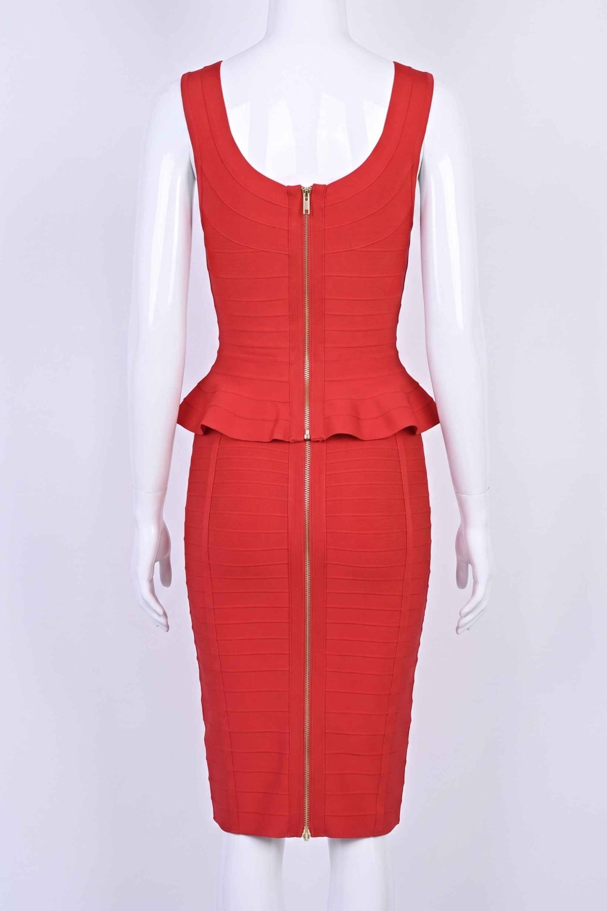 Woman wearing a figure flattering Leni Bandage Top and Knee Length Skirt Set - Lipstick Red BODYCON COLLECTION