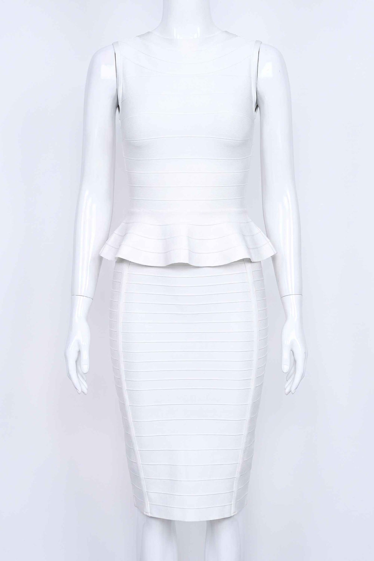 Woman wearing a figure flattering Leni Bandage Top and Knee Length Skirt Set - White Pearl BODYCON COLLECTION