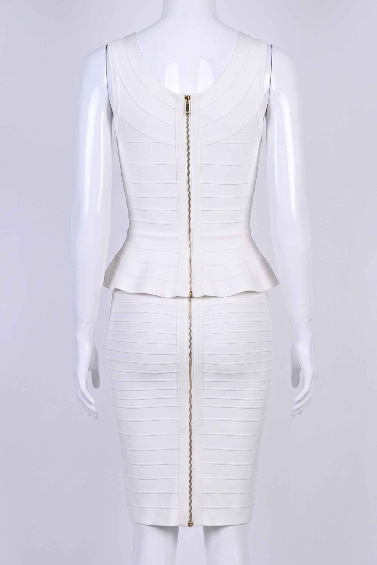 Woman wearing a figure flattering Leni Bandage Top - Pearl White BODYCON COLLECTION