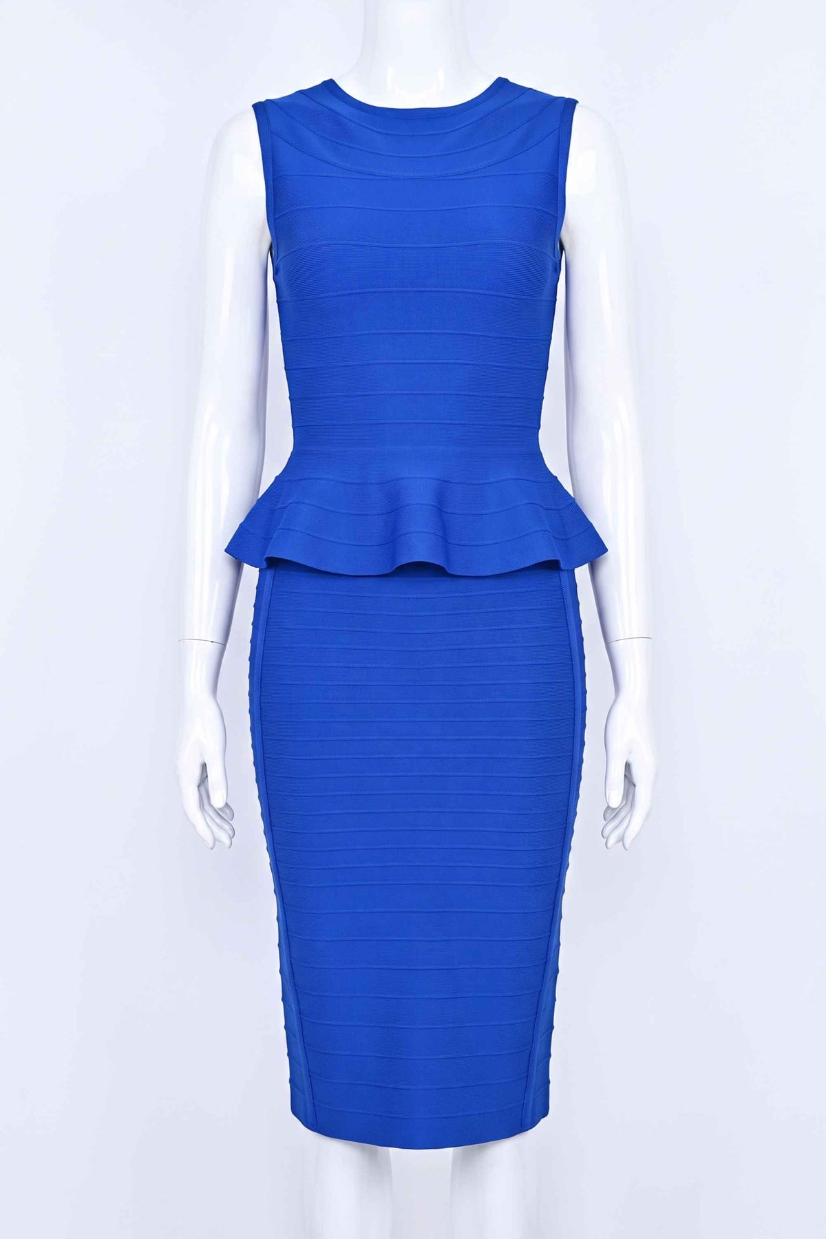Woman wearing a figure flattering Leni Bandage Top - Royal Blue BODYCON COLLECTION