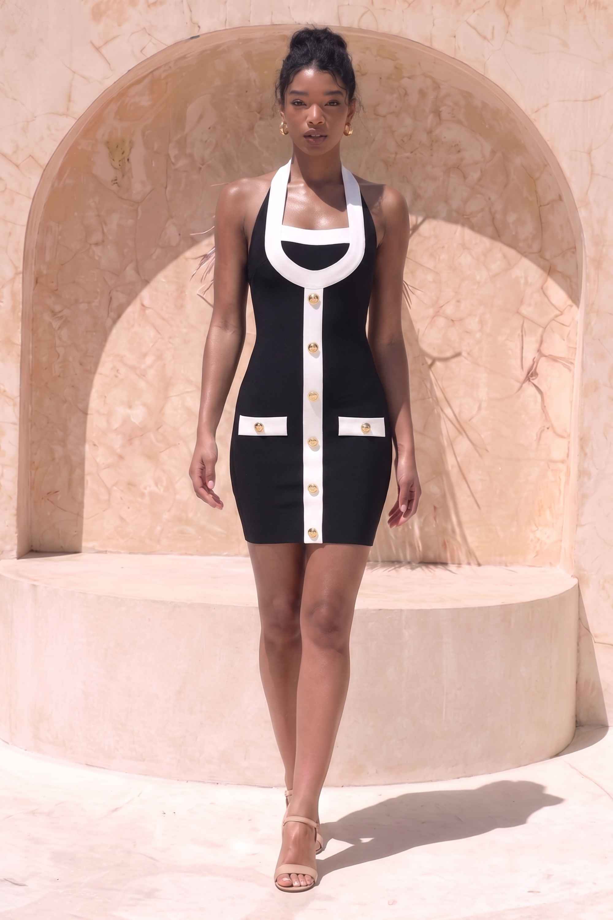 Woman wearing a figure flattering Leone Bandage Mini Dress - Classic Black BODYCON COLLECTION Pty Ltd