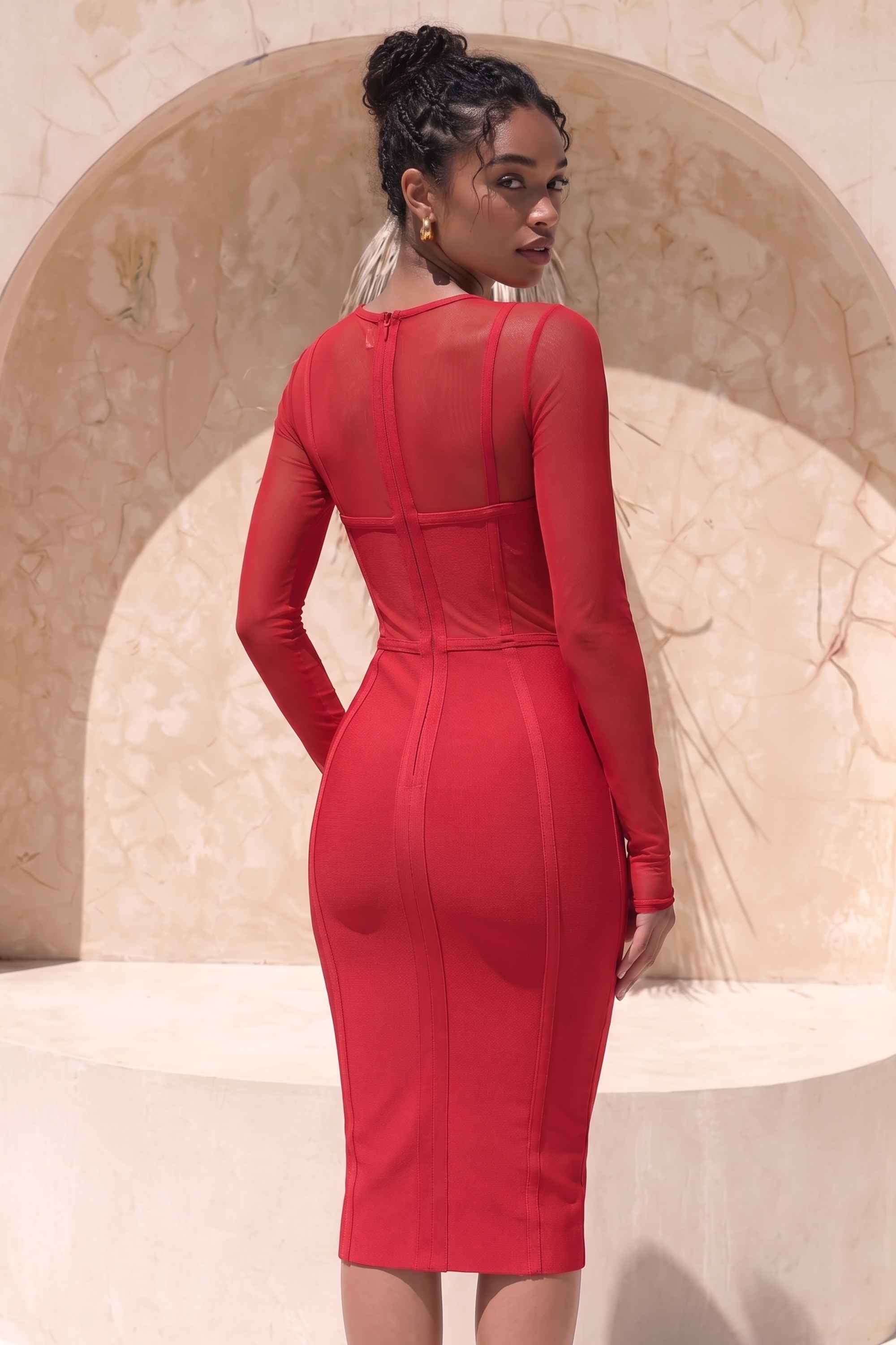 Woman wearing a figure flattering Lexi Long Sleeve Bodycon Midi Dress - Red Wine BODYCON COLLECTION