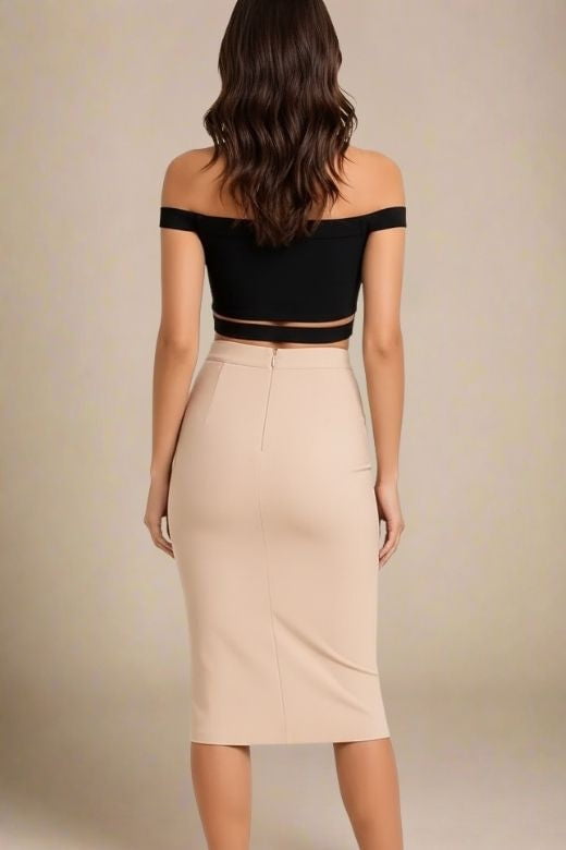 Woman wearing a figure flattering Lexia Bandage Crop Top - Classic Black BODYCON COLLECTION