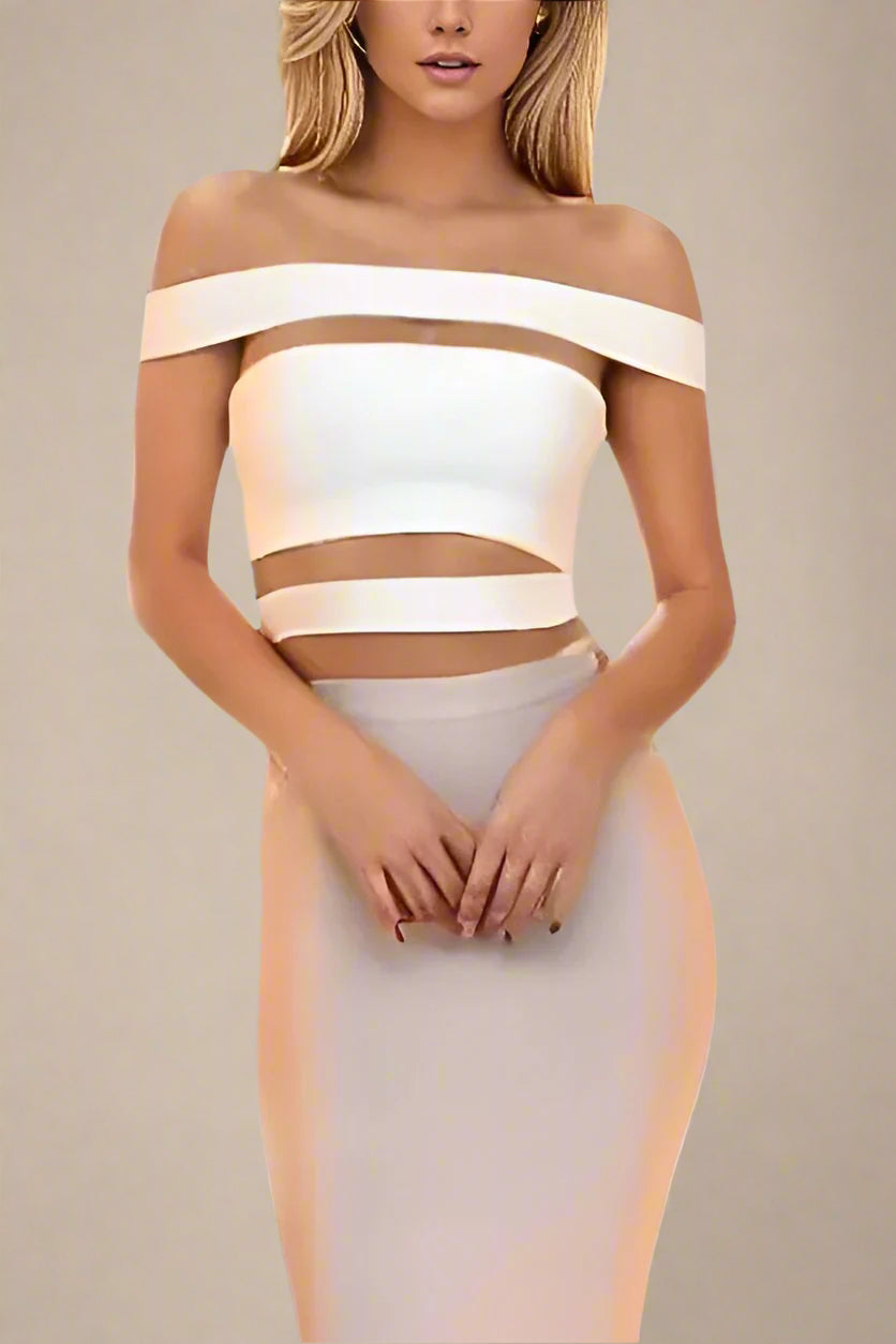 Woman wearing a figure flattering  Lexia Bandage Crop Top - Pearl White BODYCON COLLECTION