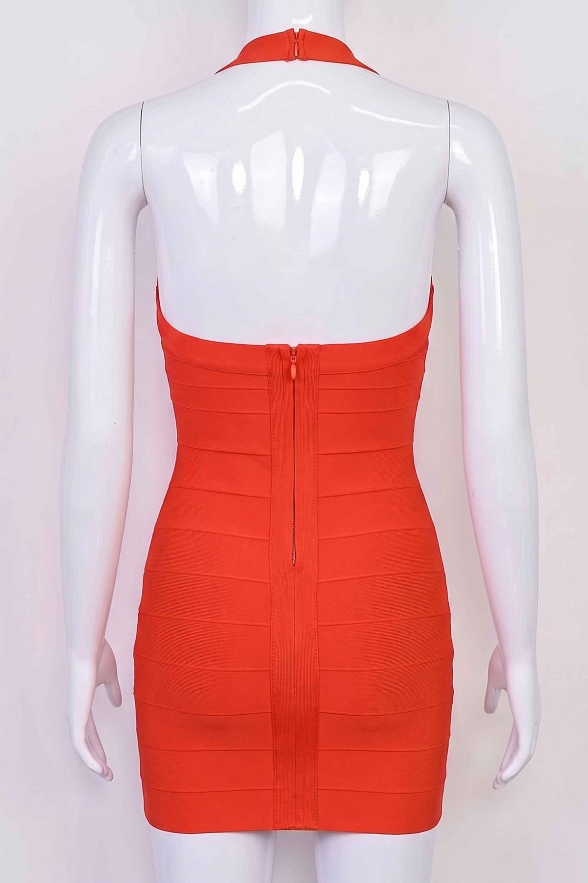 Woman wearing a figure flattering Lillian Bandage Mini Dress - Lipstick Red BODYCON COLLECTION Pty Ltd