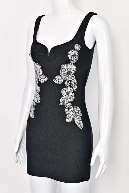Woman wearing a figure flattering Livia Bodycon Mini Dress - Classic Black BODYCON COLLECTION Pty Ltd