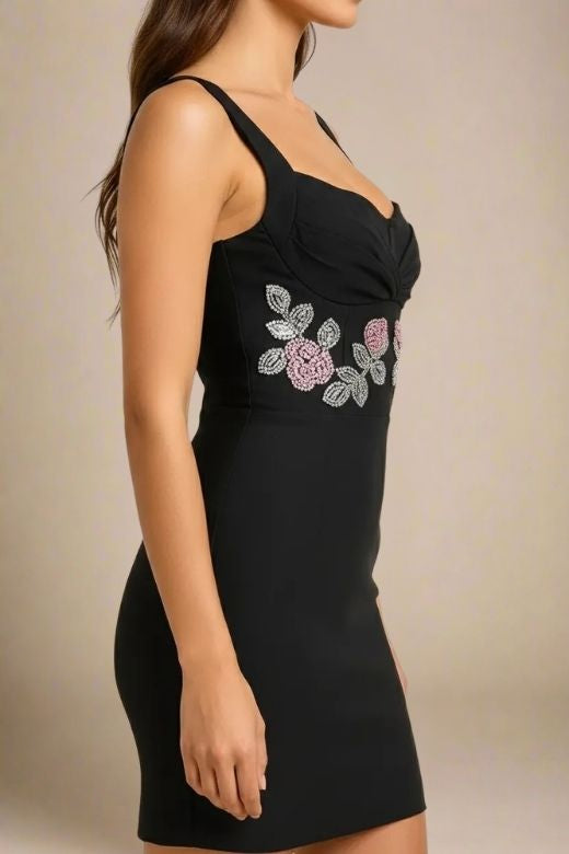 Woman wearing a figure flattering Livia Wrap Bodycon Mini Dress - Classic Black BODYCON COLLECTION Pty Ltd
