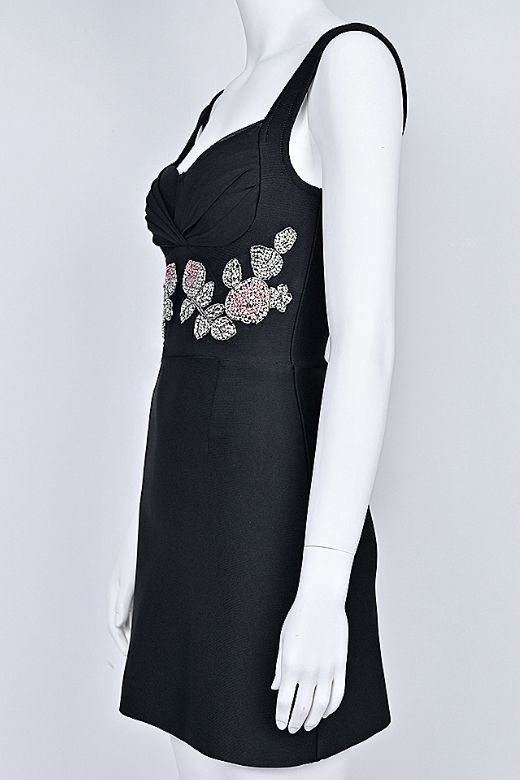 Woman wearing a figure flattering Livia Wrap Bodycon Mini Dress - Classic Black BODYCON COLLECTION Pty Ltd