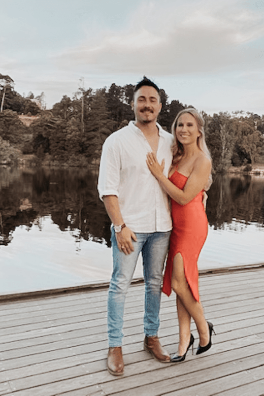 Woman wearing a figure flattering  Luna Bodycon Dress - Lipstick Red Bodycon Collection