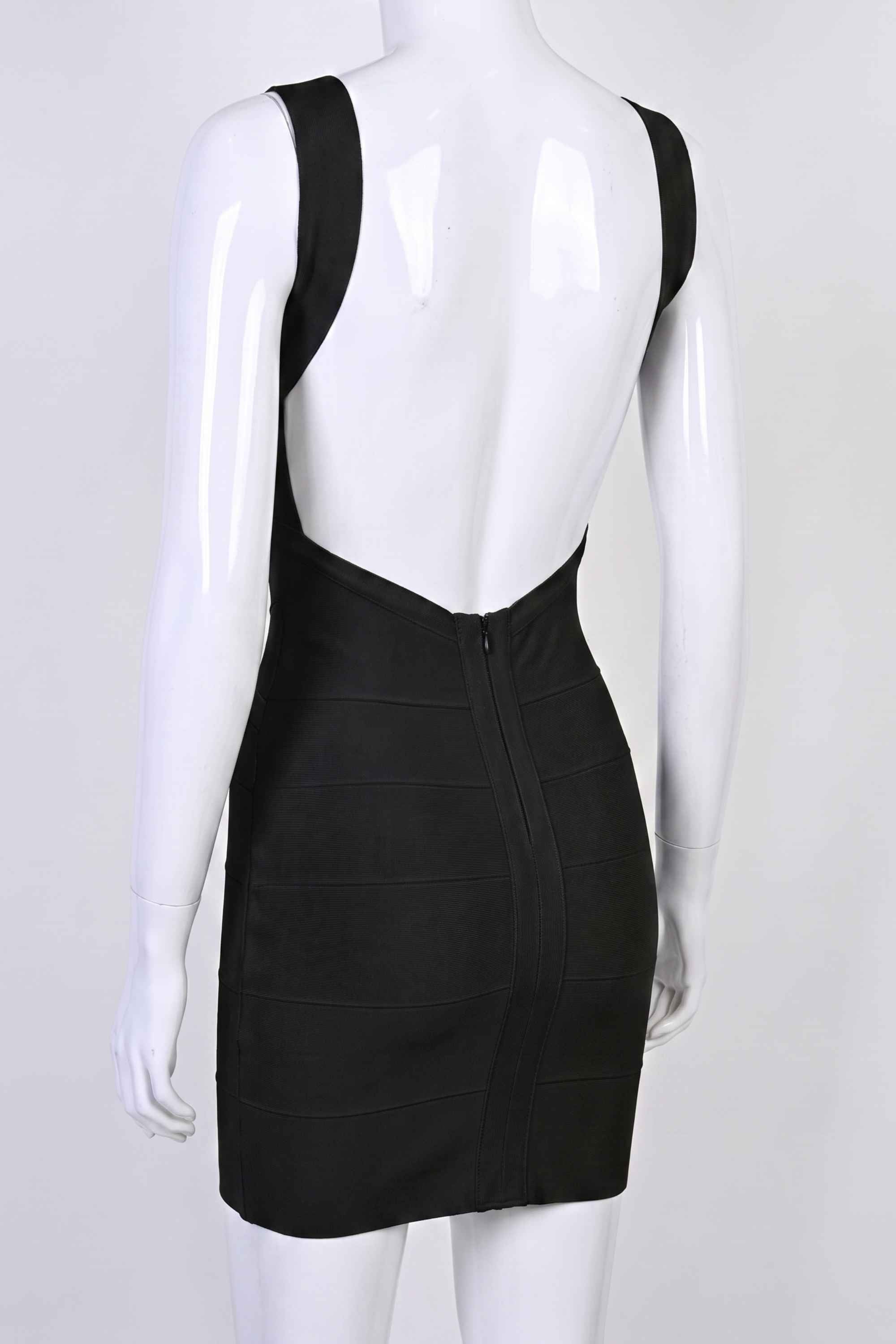 Woman wearing a figure flattering Maya Bandage Mini Dress - Classic Black BODYCON COLLECTION