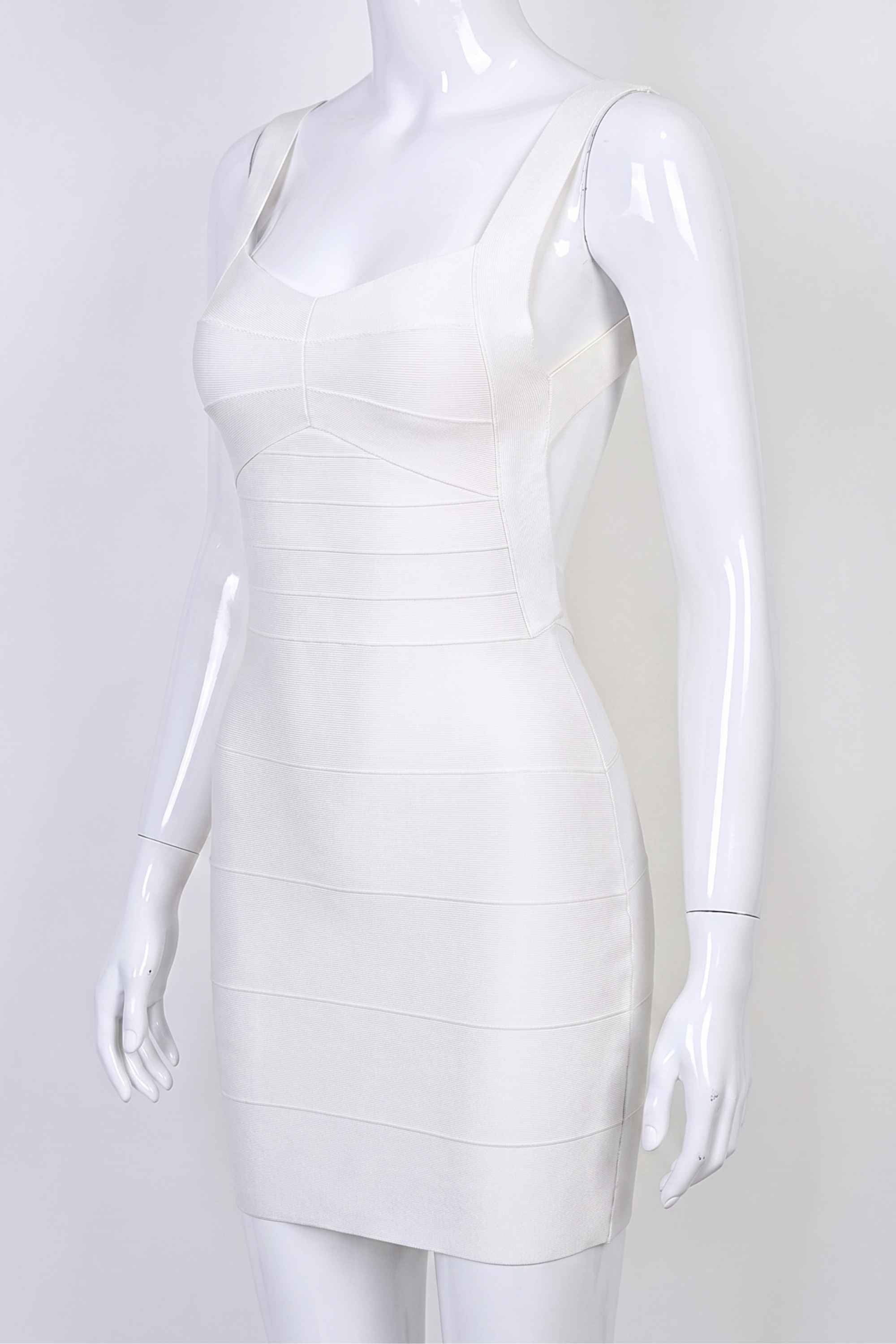 Woman wearing a figure flattering Maya Bandage Mini Dress - Pearl White BODYCON COLLECTION