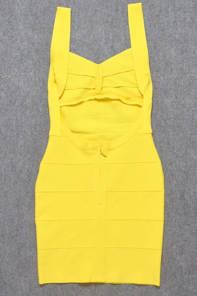 Woman wearing a figure flattering Maya Bandage Mini Dress - Sun Yellow BODYCON COLLECTION