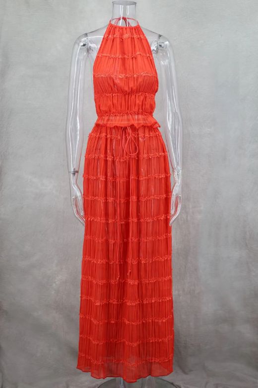 Woman wearing a figure flattering Meryl Wrap Top and Maxi Skirt Set - Chilli Red BODYCON COLLECTION