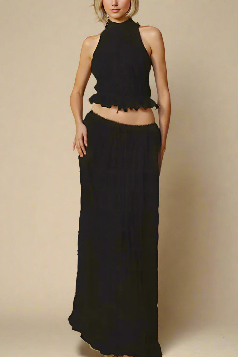 Woman wearing a figure flattering Meryl Wrap Top and Maxi Skirt Set - Classic Black BODYCON COLLECTION