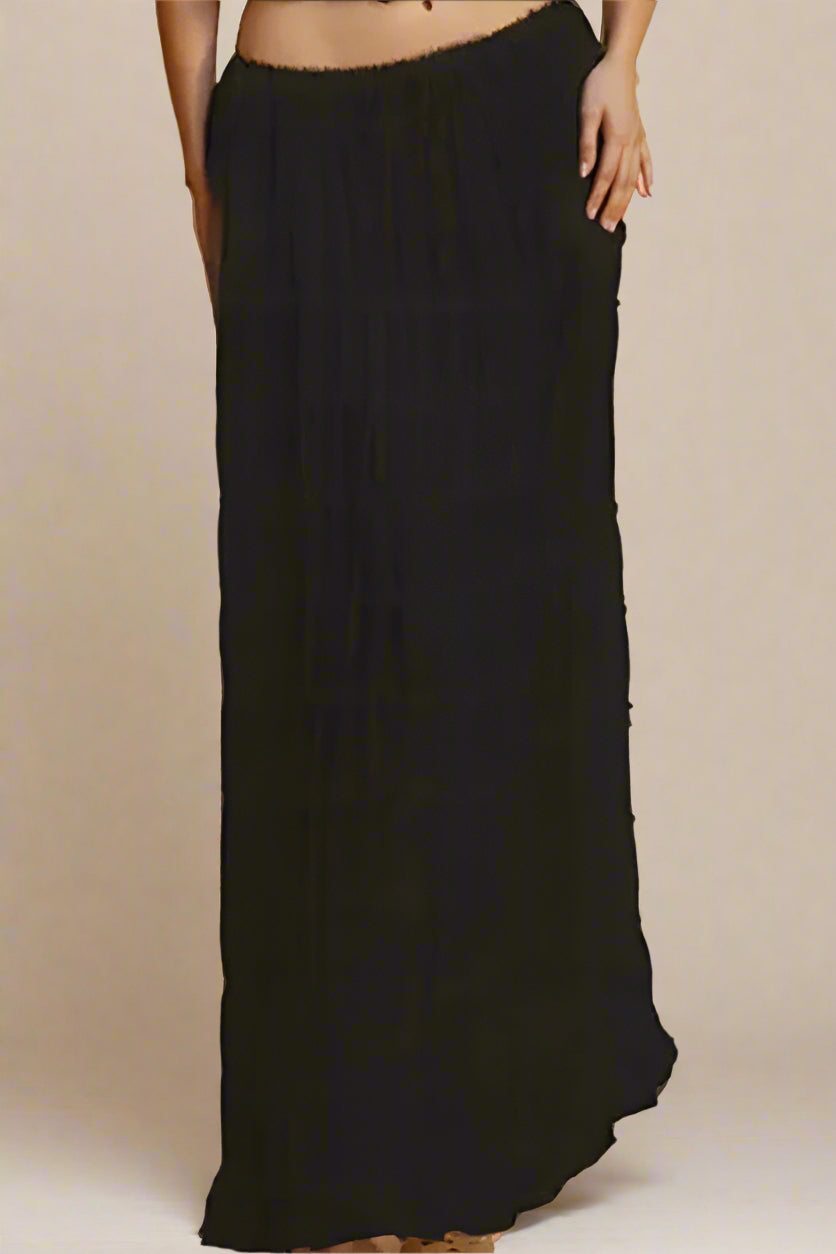 Woman wearing a figure flattering Meryl Wrap Top and Maxi Skirt Set - Classic Black BODYCON COLLECTION