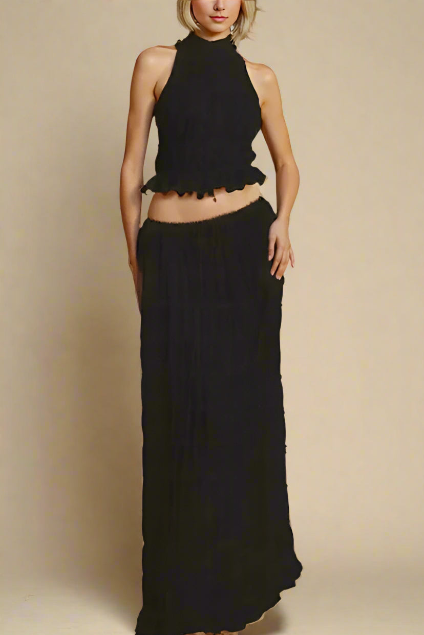 Woman wearing a figure flattering Meryl Wrap Top and Maxi Skirt Set - Classic Black BODYCON COLLECTION