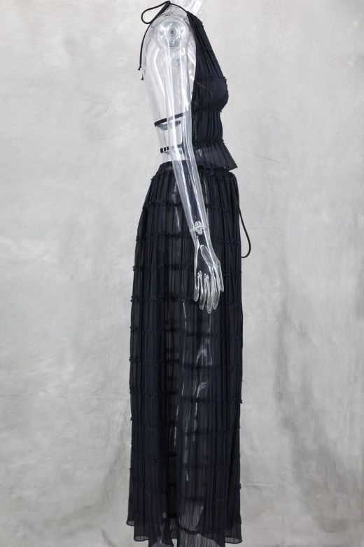 Woman wearing a figure flattering Meryl Wrap Top and Maxi Skirt Set - Classic Black BODYCON COLLECTION