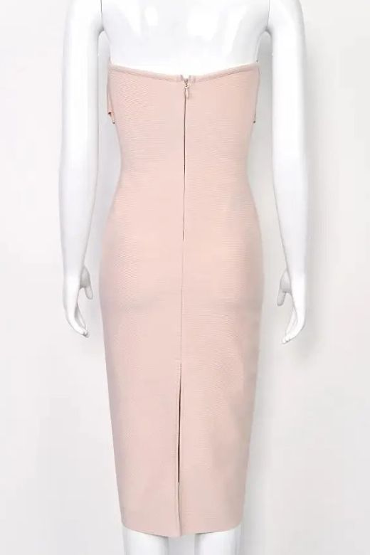 Woman wearing a figure flattering Miles Bodycon Midi Dress - Nude BODYCON COLLECTION