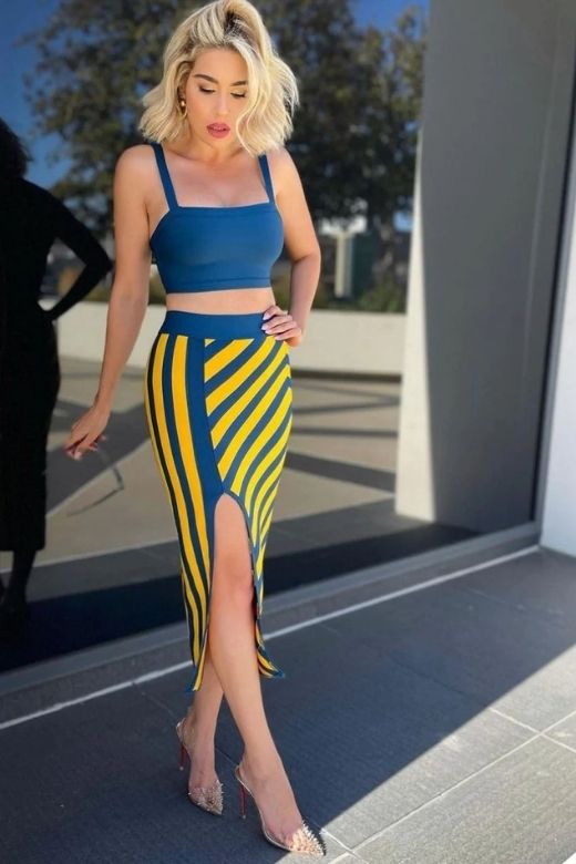 Woman wearing a figure flattering Nadia Bandage Crop Top and Midi Skirt Outfit Set - Royal Blue BODYCON COLLECTION