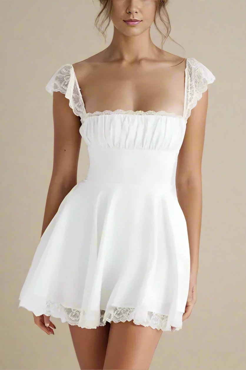 Woman wearing a figure flattering Nori Bodycon Mini Dress - Pearl White BODYCON COLLECTION