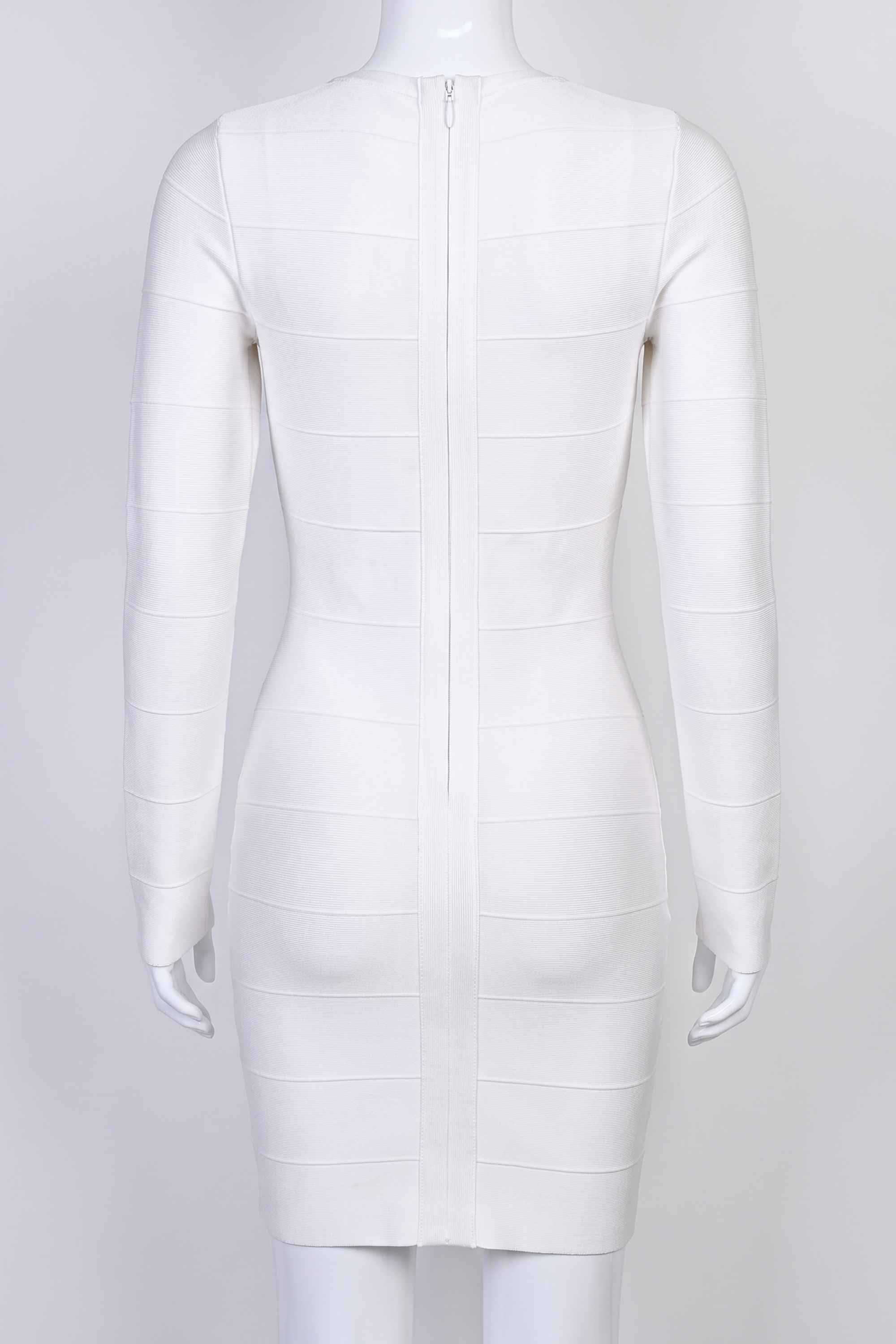 Woman wearing a figure flattering Pamela Long Sleeve Bandage Mini Dress - Pearl White BODYCON COLLECTION