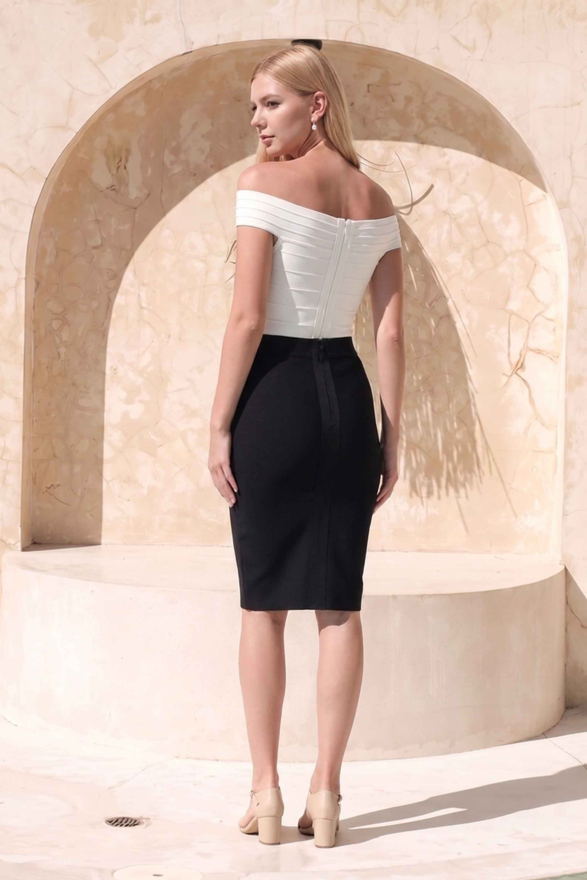 Woman wearing a figure flattering Pencil High Waist Bandage Knee Length Skirt - Classic Black BODYCON COLLECTION